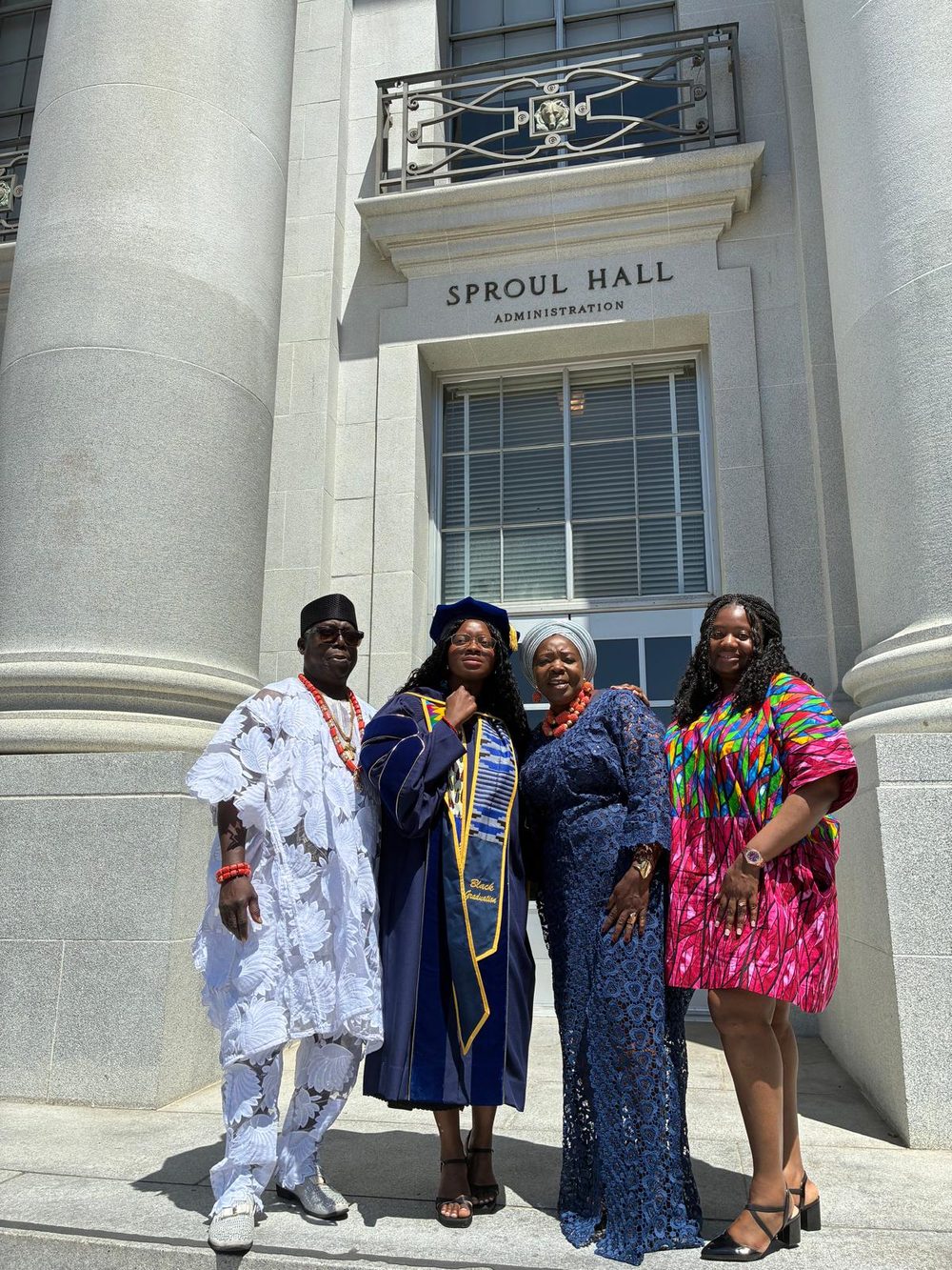 The Otebele family celebrating a graduation milestone